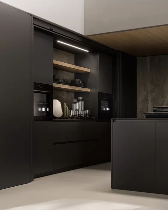 Arkè Collection - Architectural hidden kitchen featuring retractable pocket doors that reveal an equipped workstation with integrated LED lighting and a textured grey finish.